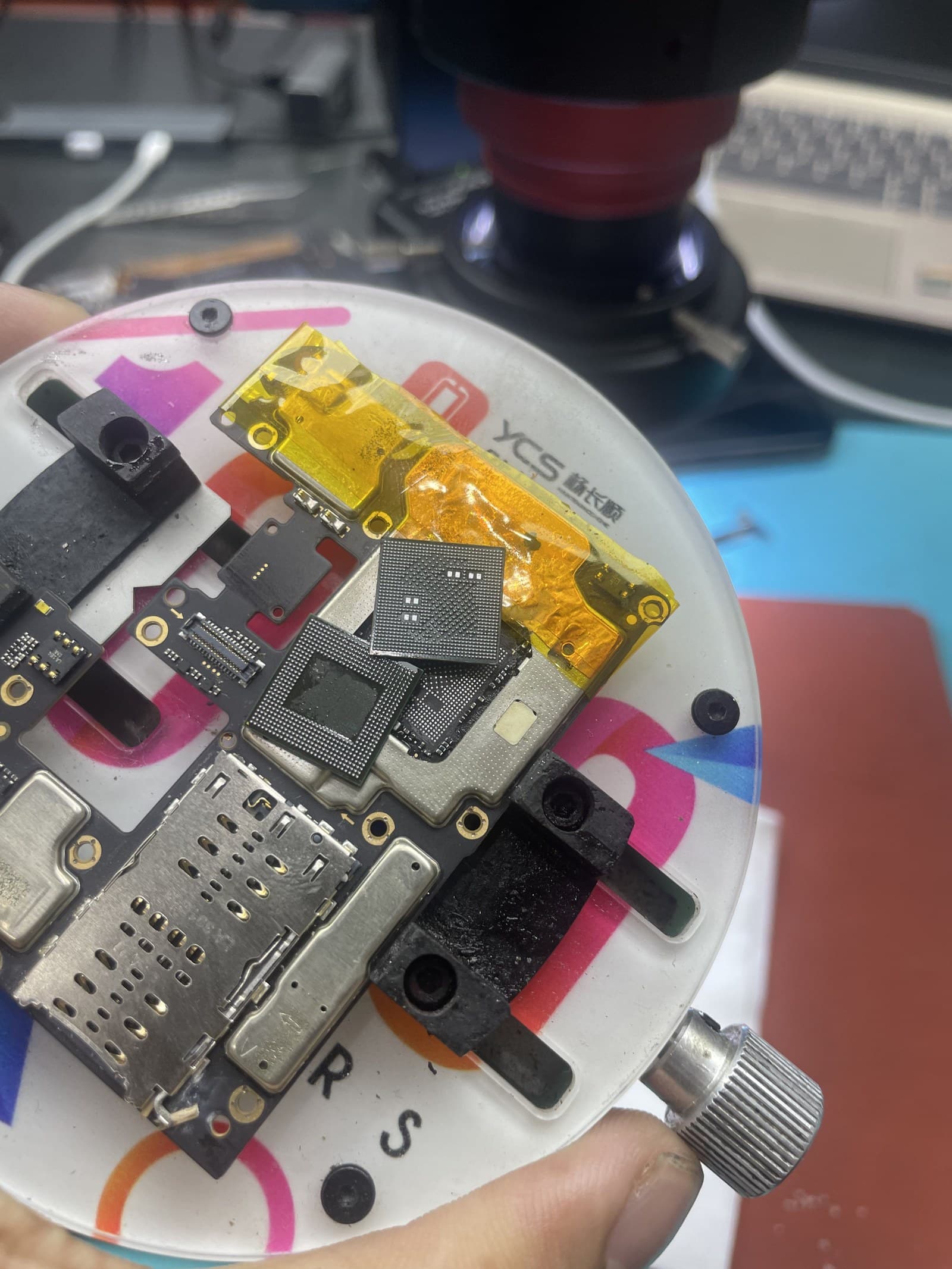 Board in jig — component-level repair